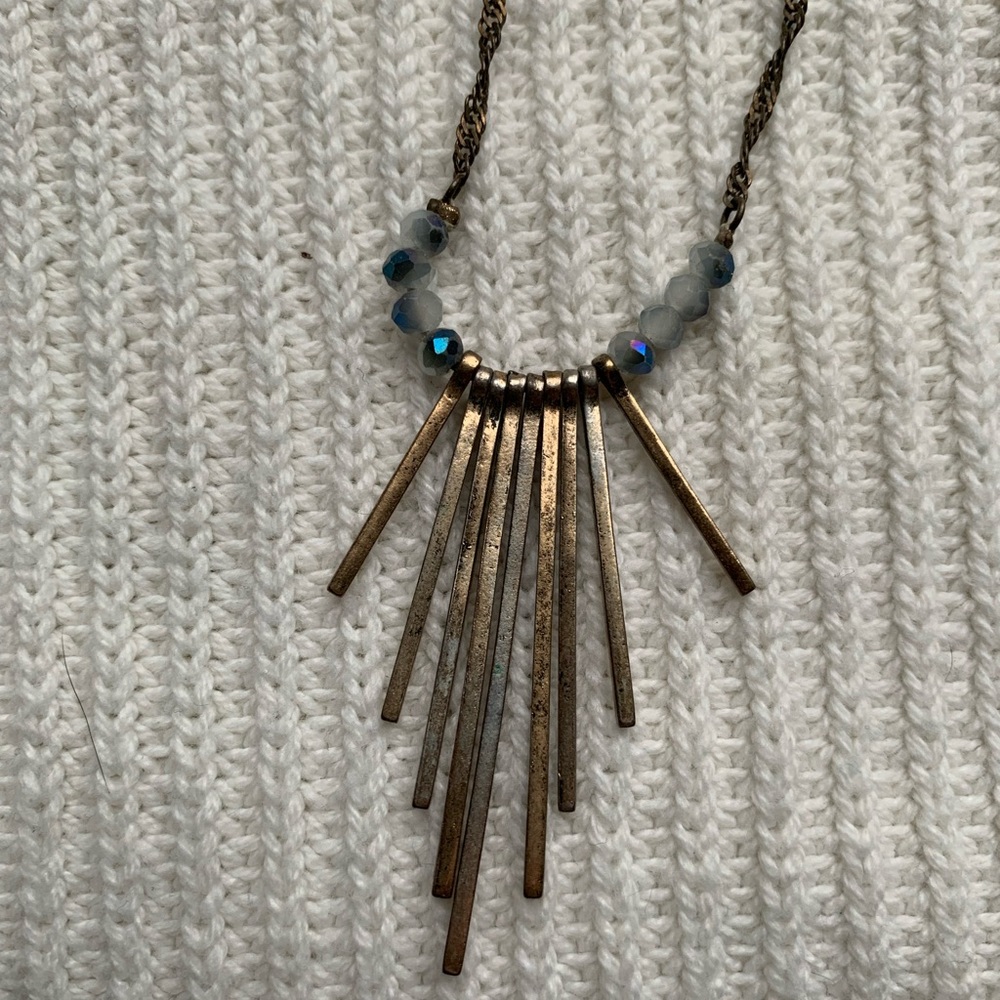 Long necklace with blue gemstones
